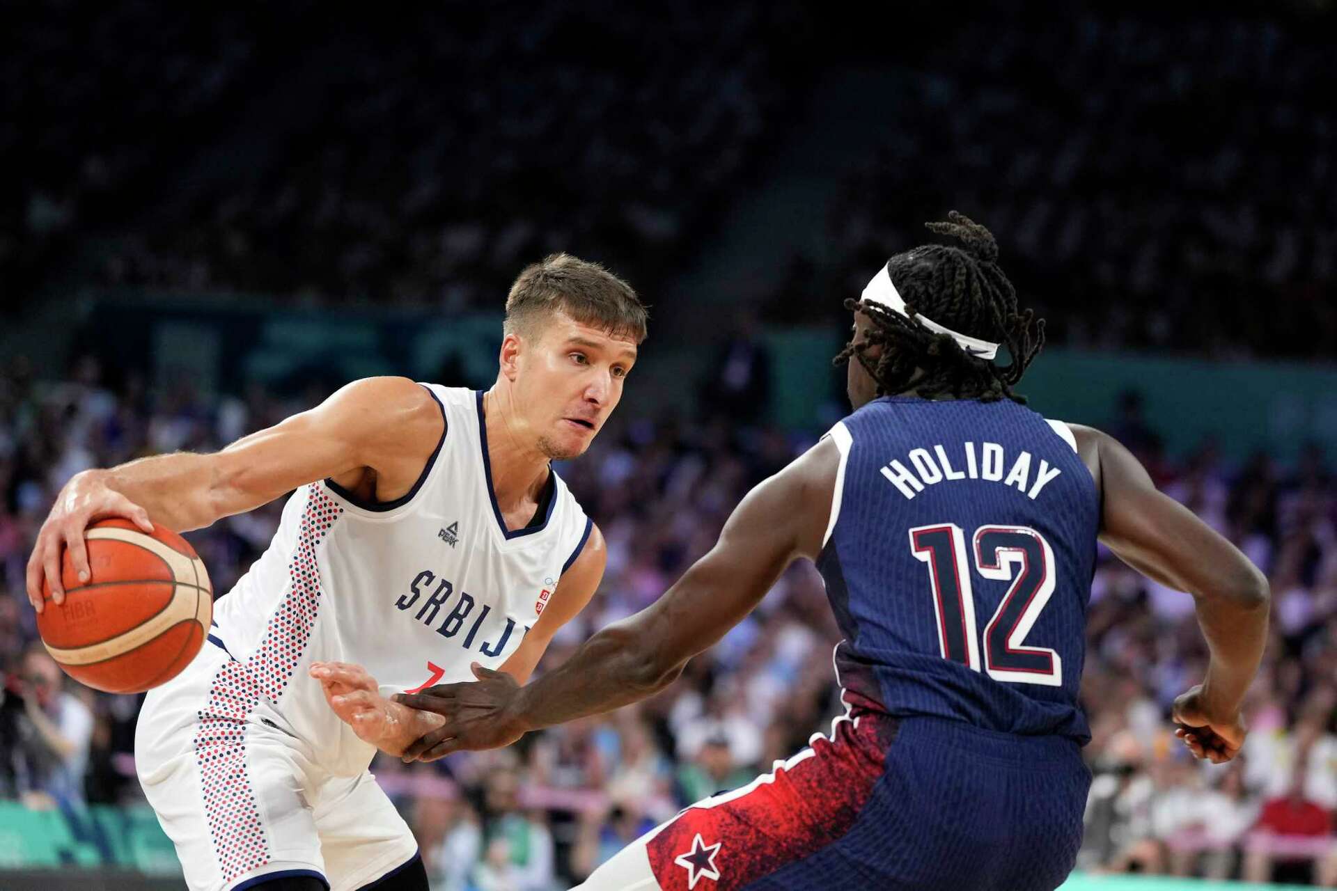 US men's basketball team rolls past Serbia 110-84 in opening game at the  Paris Olympics